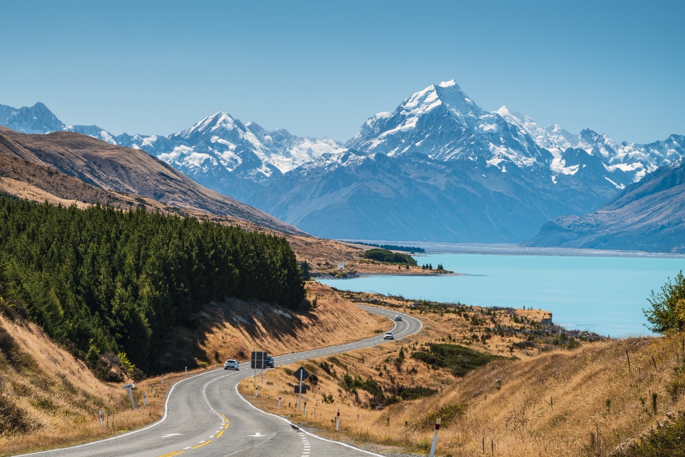 Aoraki / Mount Cook and a road beside Lake Pukaki, New Zealand